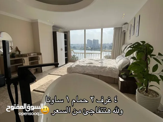 وحده فندقية 78 متر متشطبة بالكامل وبالتكيفات والفرش والأجهزة ع النيل مباشرة