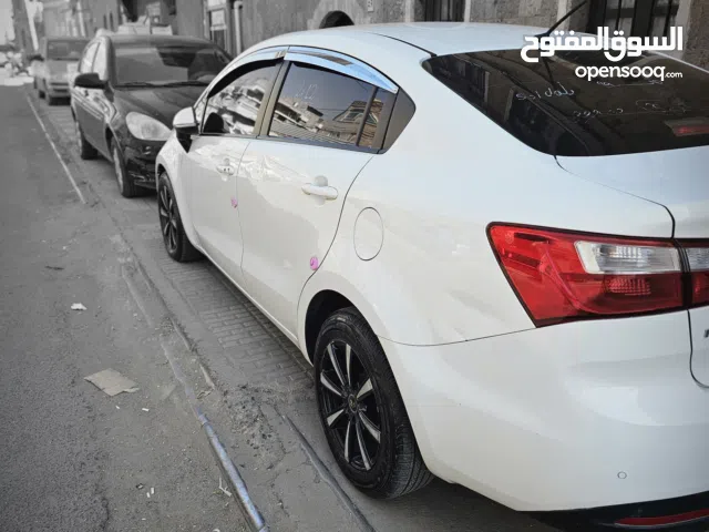 كيا برايد 2012 ابيض فل كامل