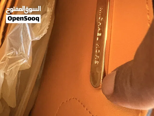 Hand Bags Orange for sale  in Dhofar