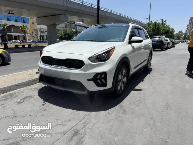 كيا نيرو هايبرد 2020 لون ابيض لؤلؤي فحص 4 جيد نظيفة جداً ممشى قليل