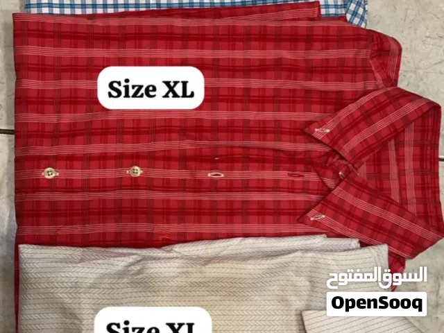 تشكيلة ملابس رجالية قمصان وبلايز وغيرها بمقاسات متنوعة