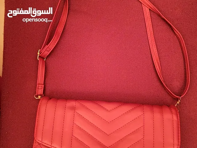 Red handbag with casual use