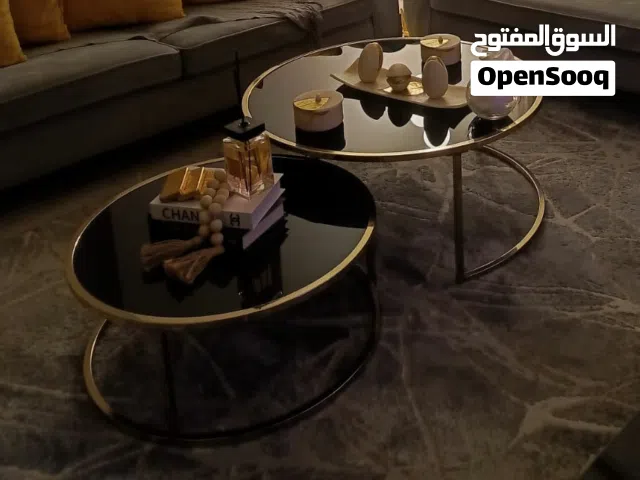 طاولة تلفزيون جوارير مع طربيزات وسط زجاج