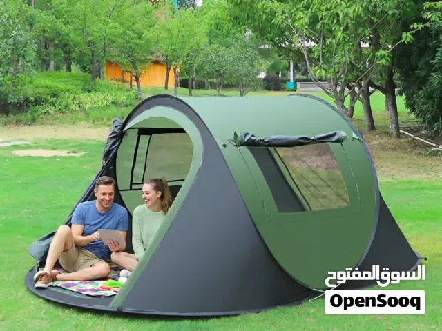 3-4 Person Instant Outdoor Tent designed for camping or beach use, featuring a green and black color