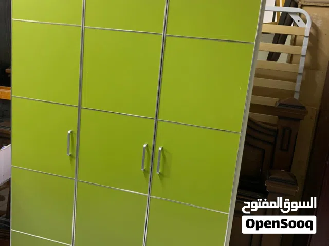 White and Green 3 door cupboard neat and clean with drawers