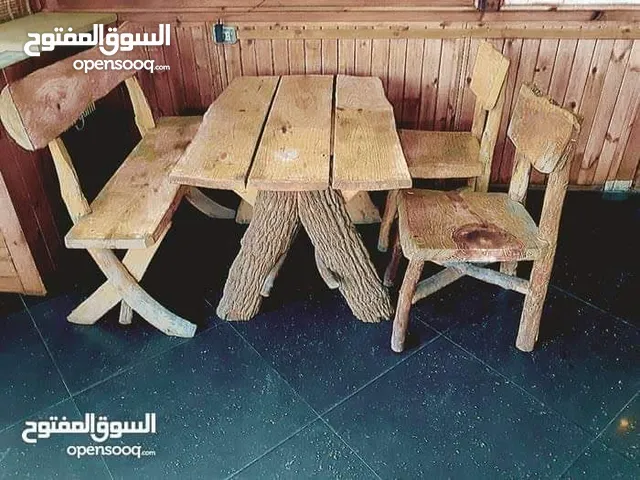 طاولات خشب مهوقن