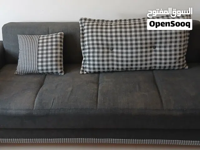 Sofa bed with storage space
