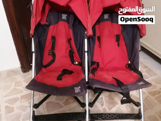عرباية اطفال توأم + قفص للعب + لعبة بعجلات