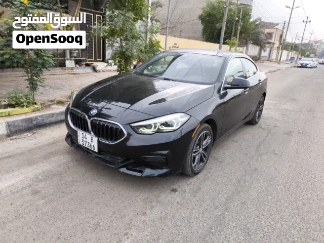 BMW 228i الفئة الثانية بدون حادث فقط بارد قليل بالباب ايرباك سليم رقم جديد ماكو بنظافتها موديل 2023