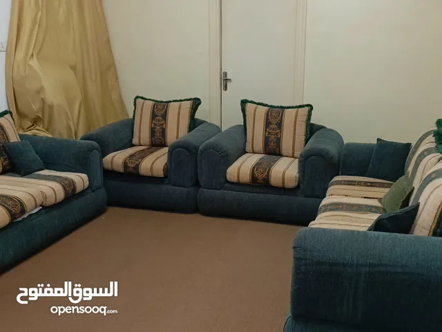 كنب مخمل لون زيتي وذهبي
