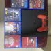 PS4 with one controller and games